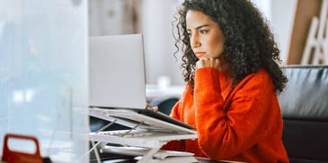 Woman looking at calendar on computer