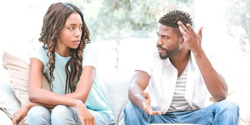 frustrated woman and man having a difficult conversation