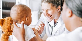 doctor smiling at baby