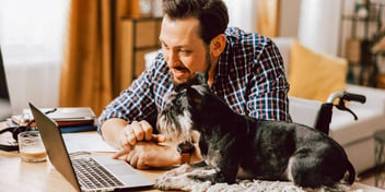 man and his little scotty dog looking over their pawrenting agreement