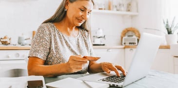 woman making a credit card payment online