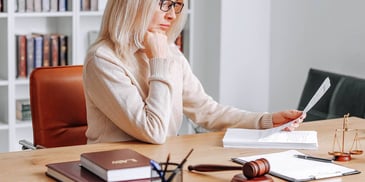 woman reviewing a request for order on support or custody