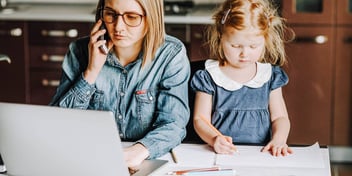 mom and daughter on laptop together